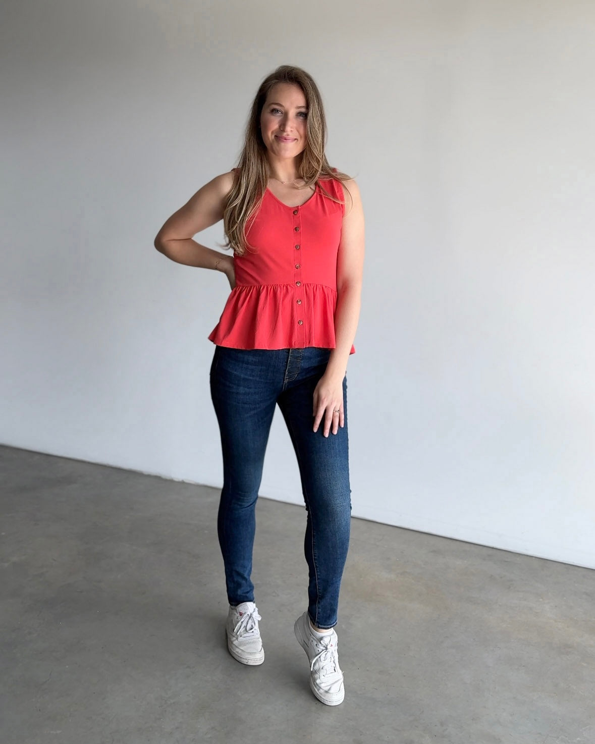 BARI peplum tank in Coral Red