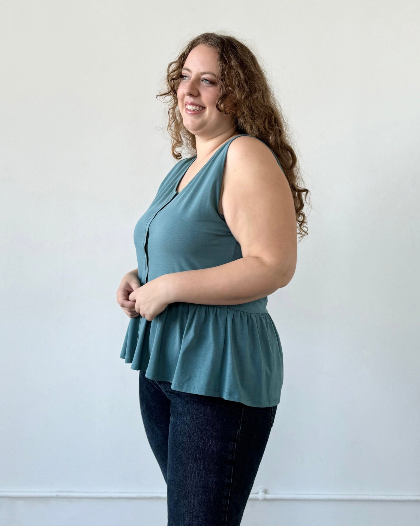 BARI peplum tank in Dark Aqua