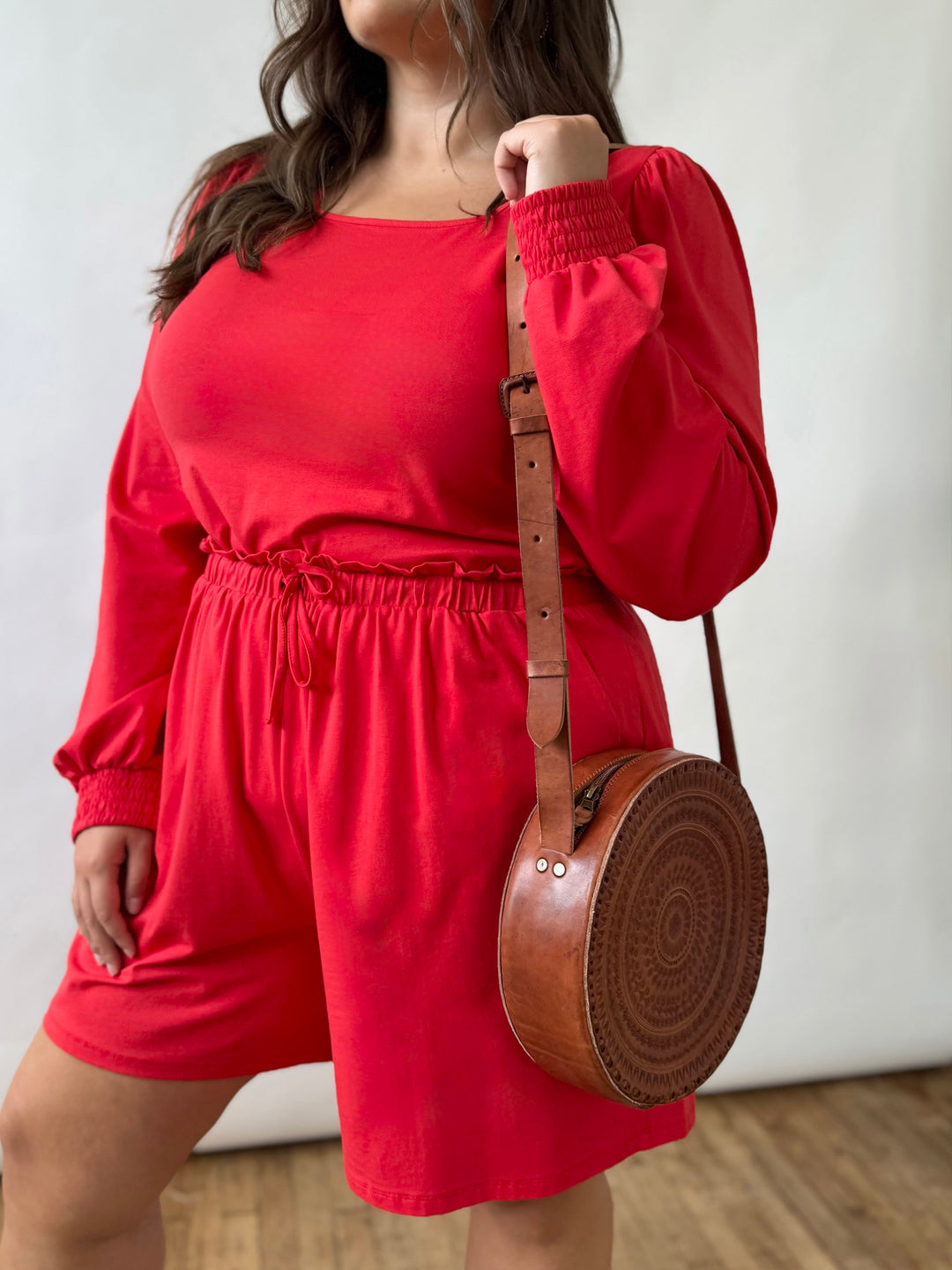 Embossed Circle Crossbody