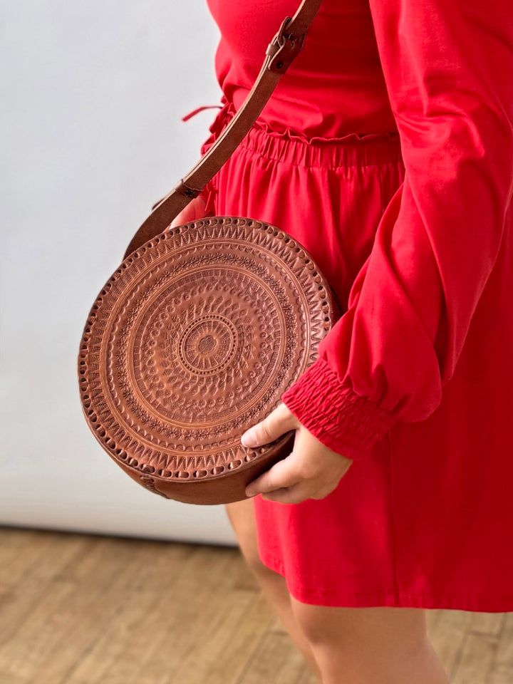 Embossed Circle Crossbody