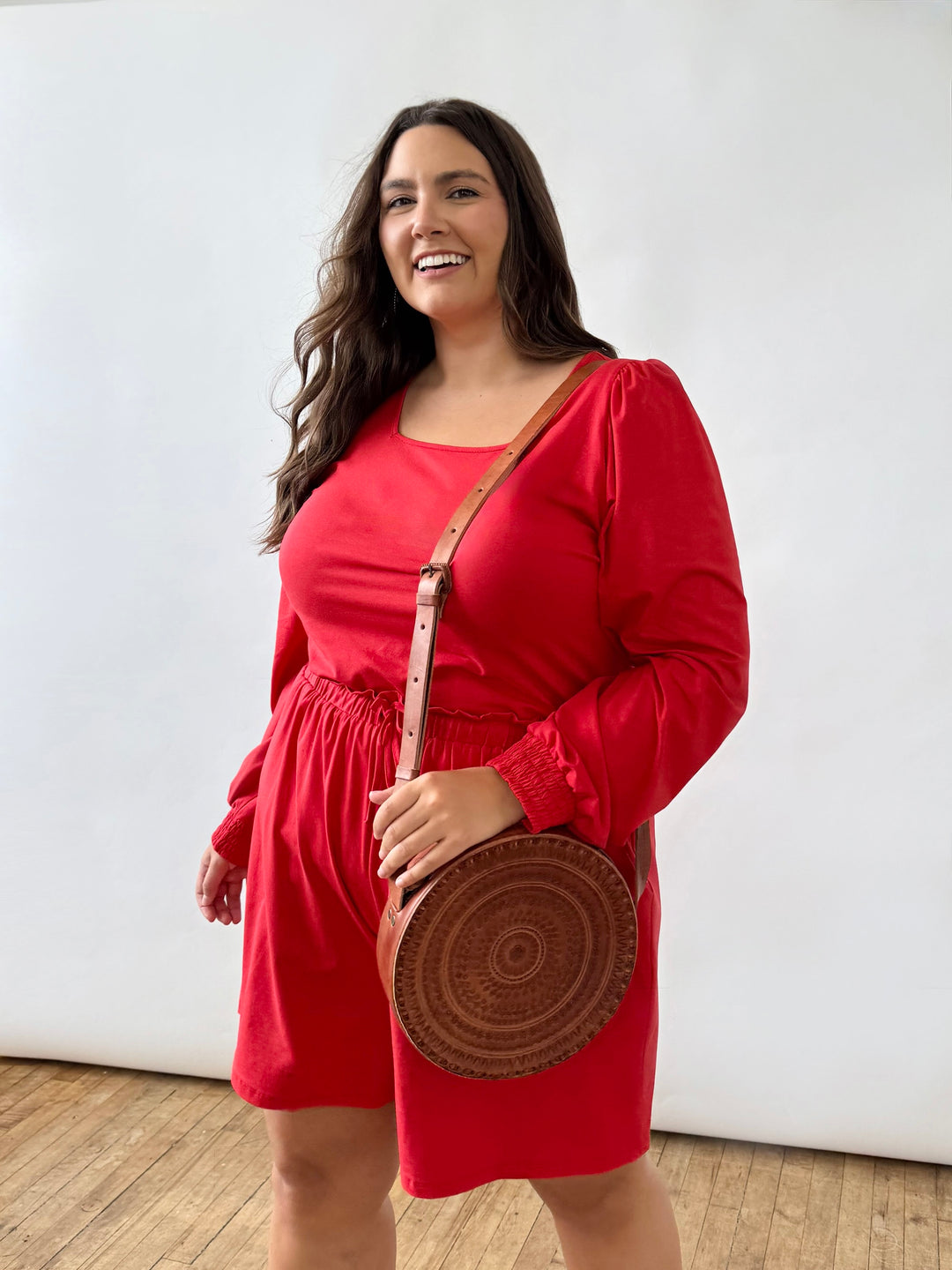 Embossed Circle Crossbody