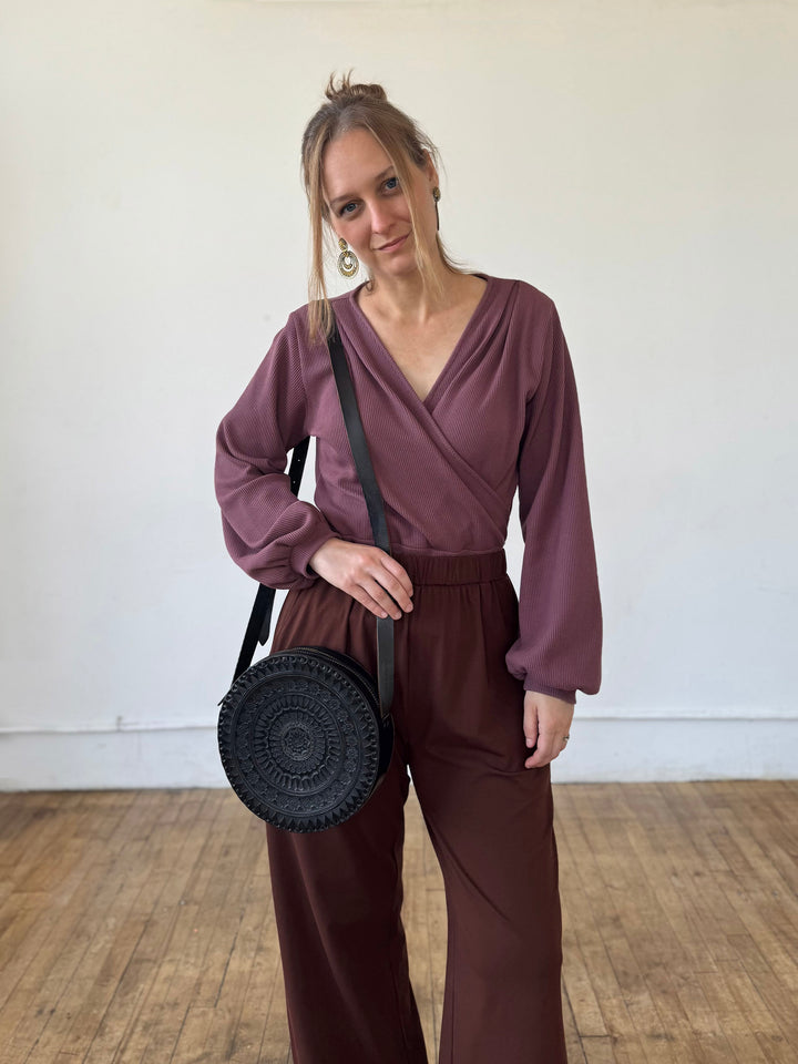 Embossed Circle Crossbody