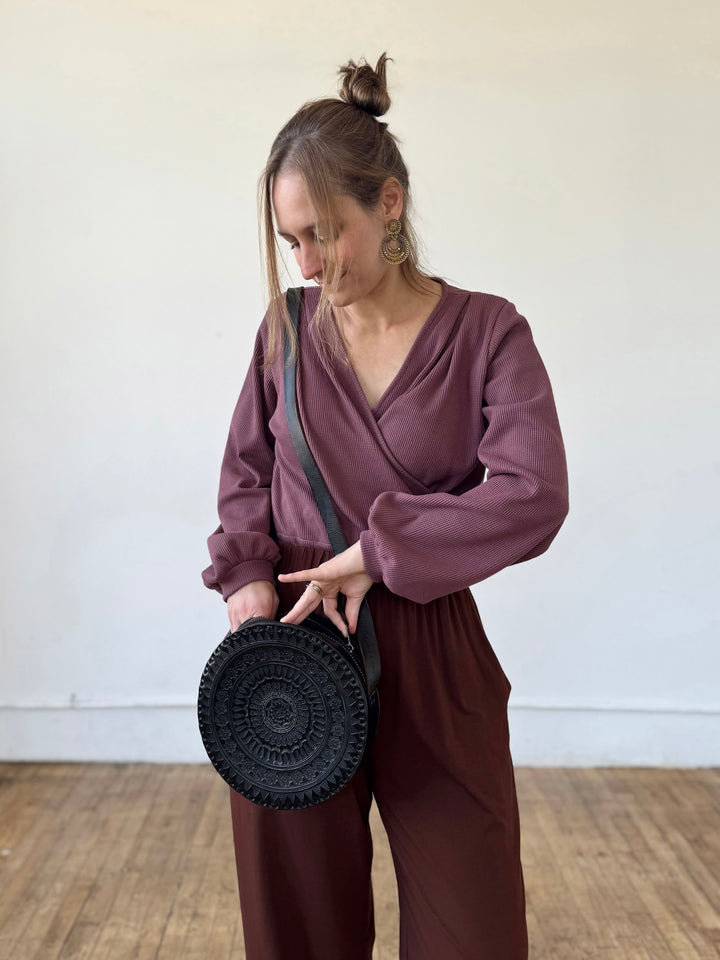 Embossed Circle Crossbody