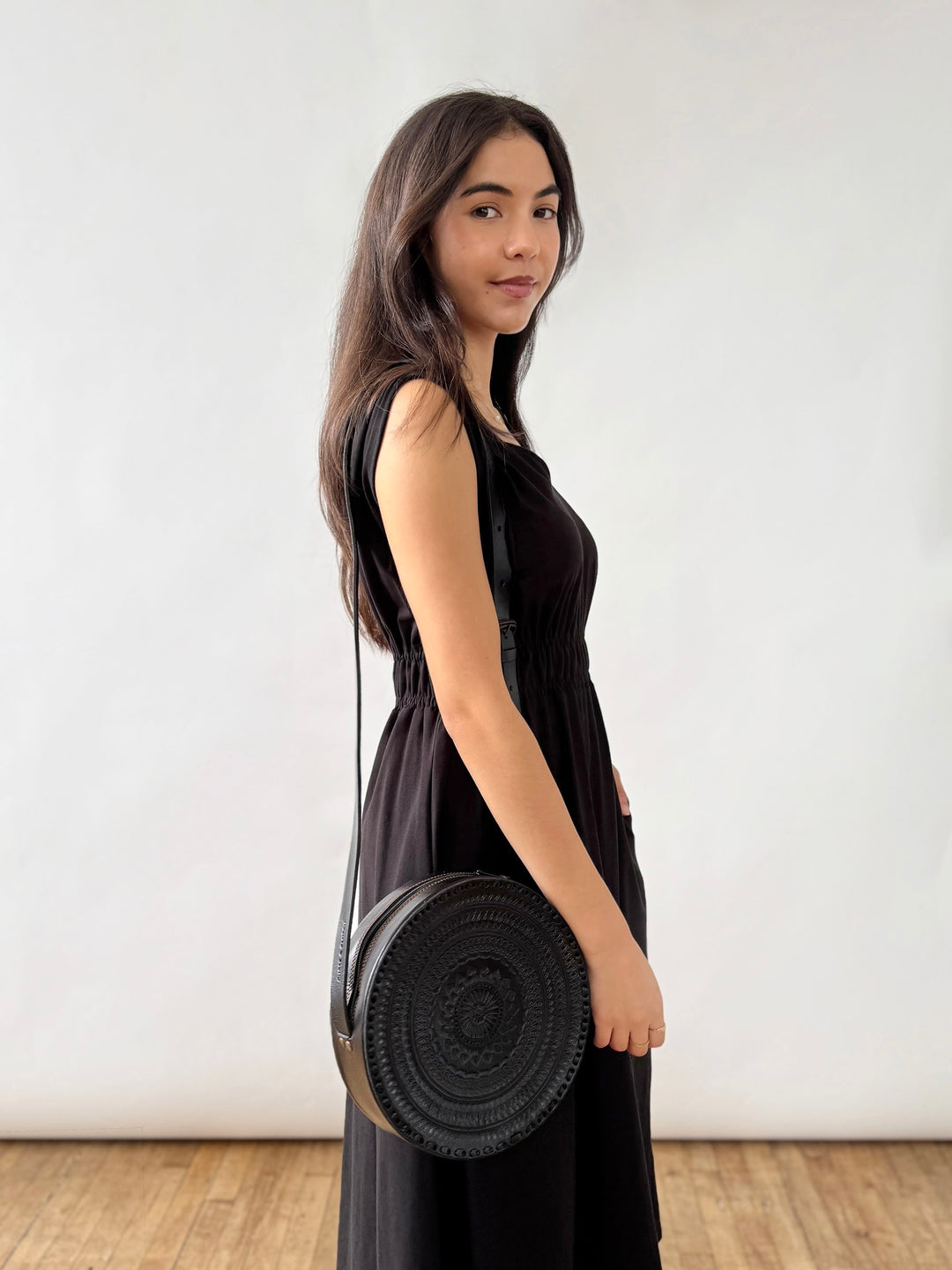 Embossed Circle Crossbody