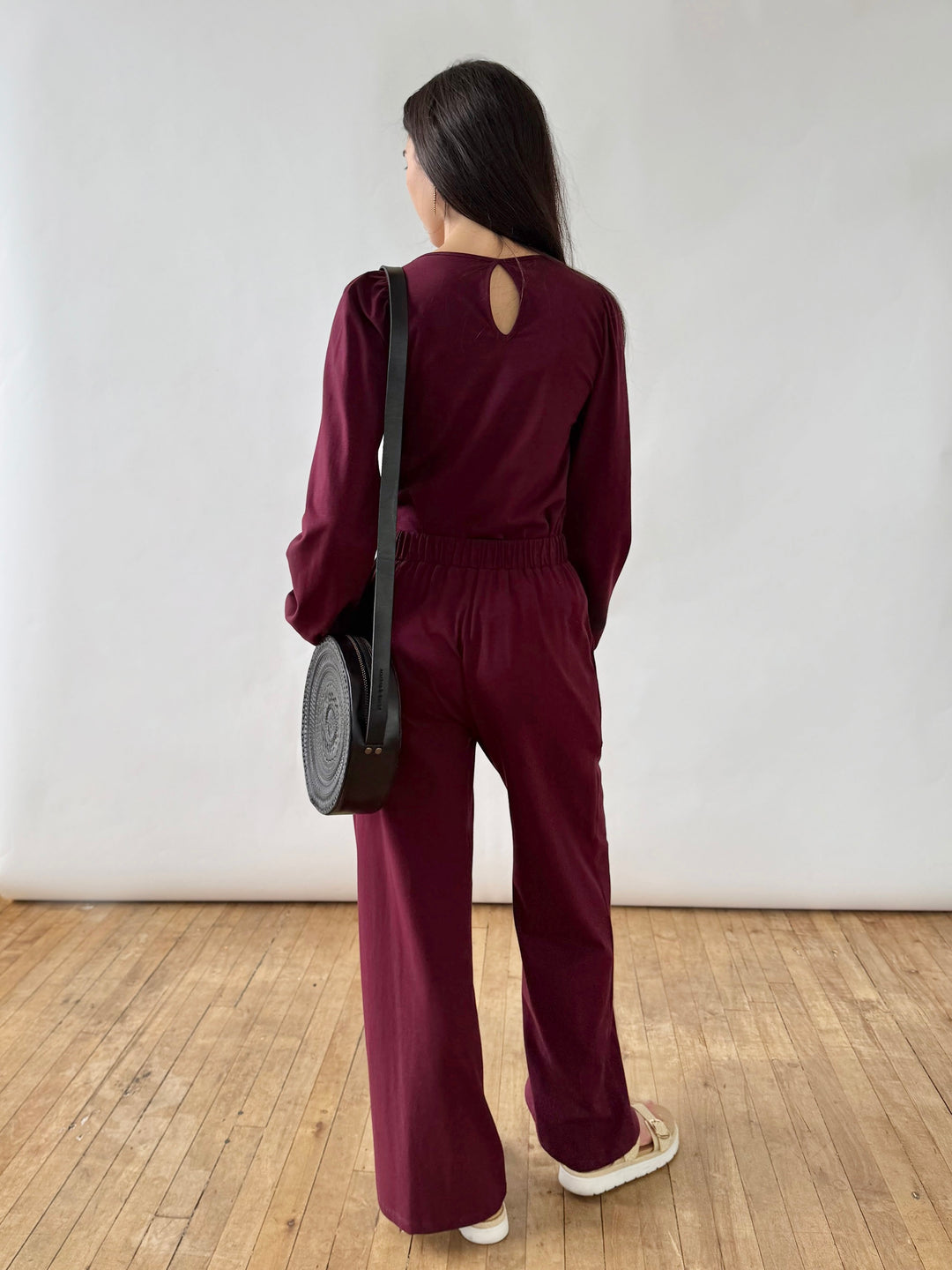 Embossed Circle Crossbody