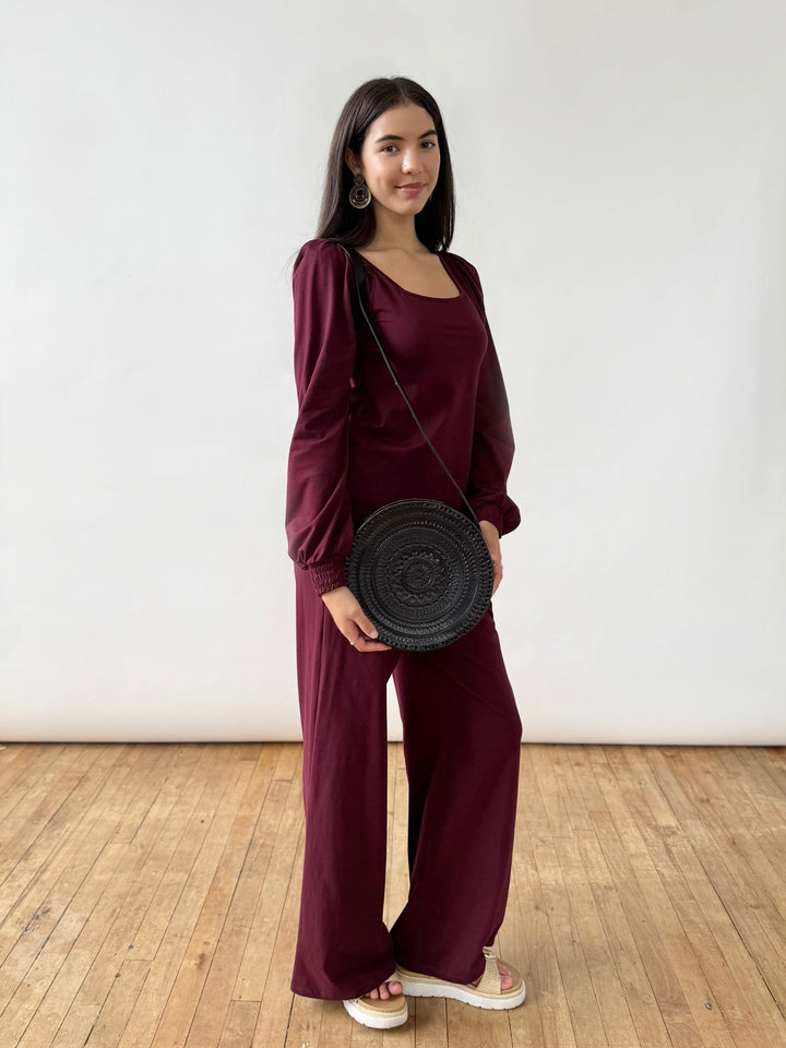 Embossed Circle Crossbody