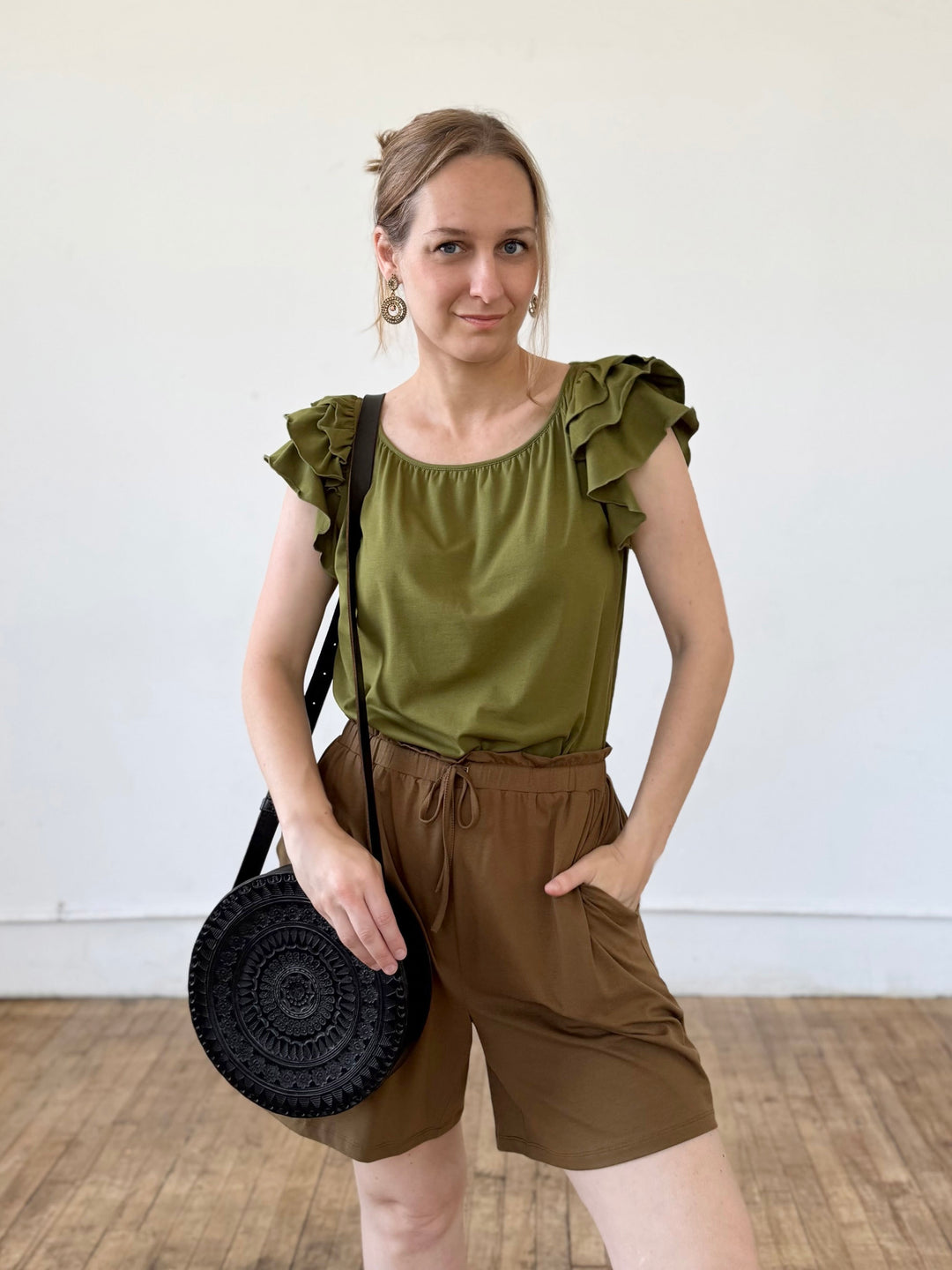 Embossed Circle Crossbody