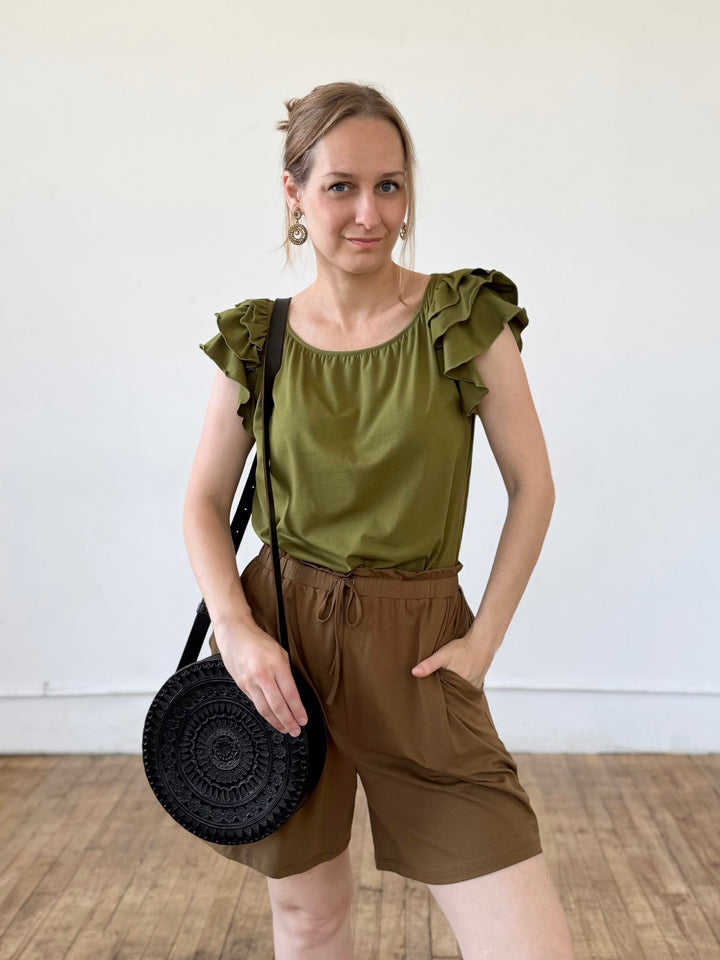 Embossed Circle Crossbody