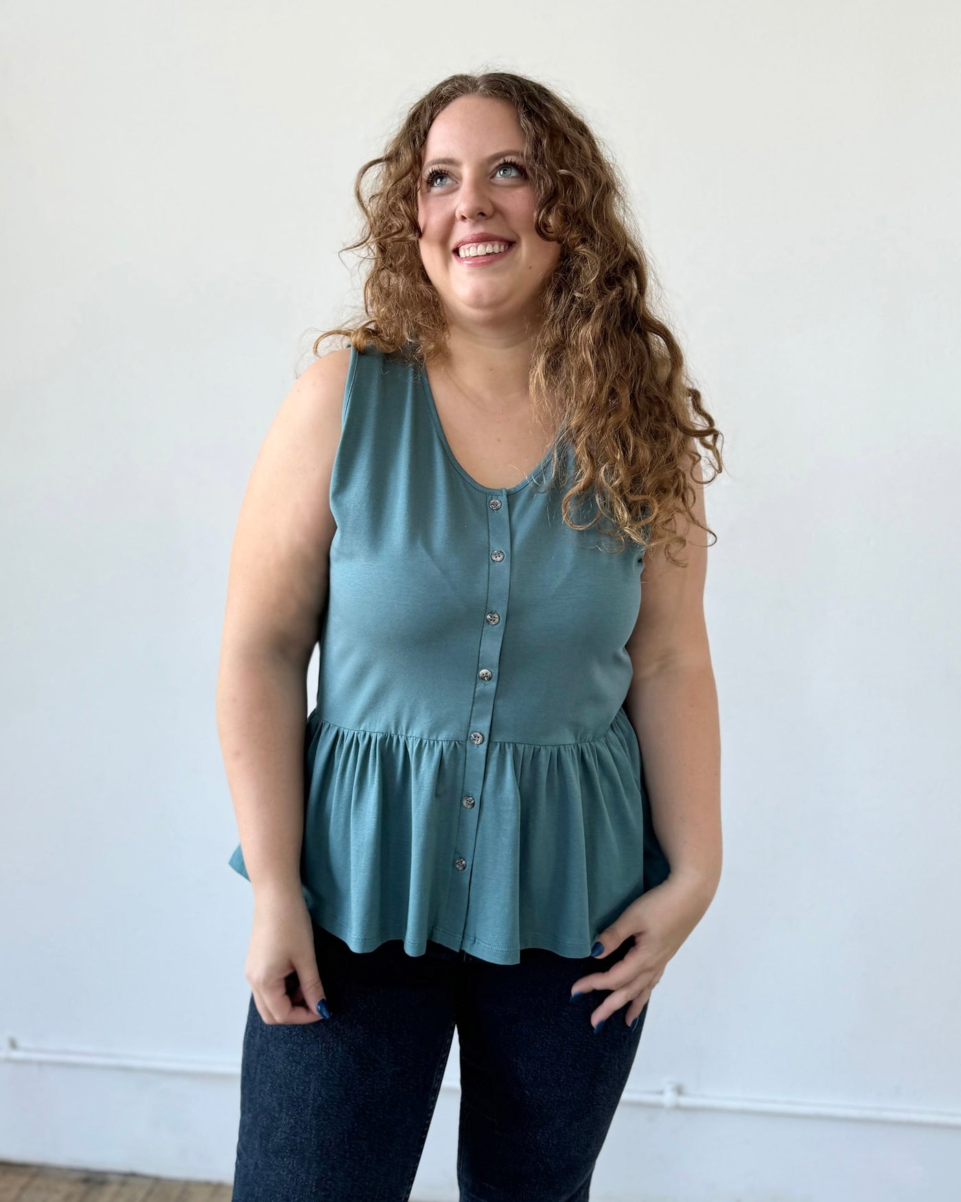 BARI peplum tank in Dark Aqua