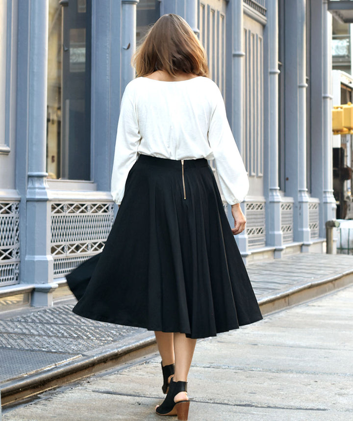 The MALALA midi skirt in Black